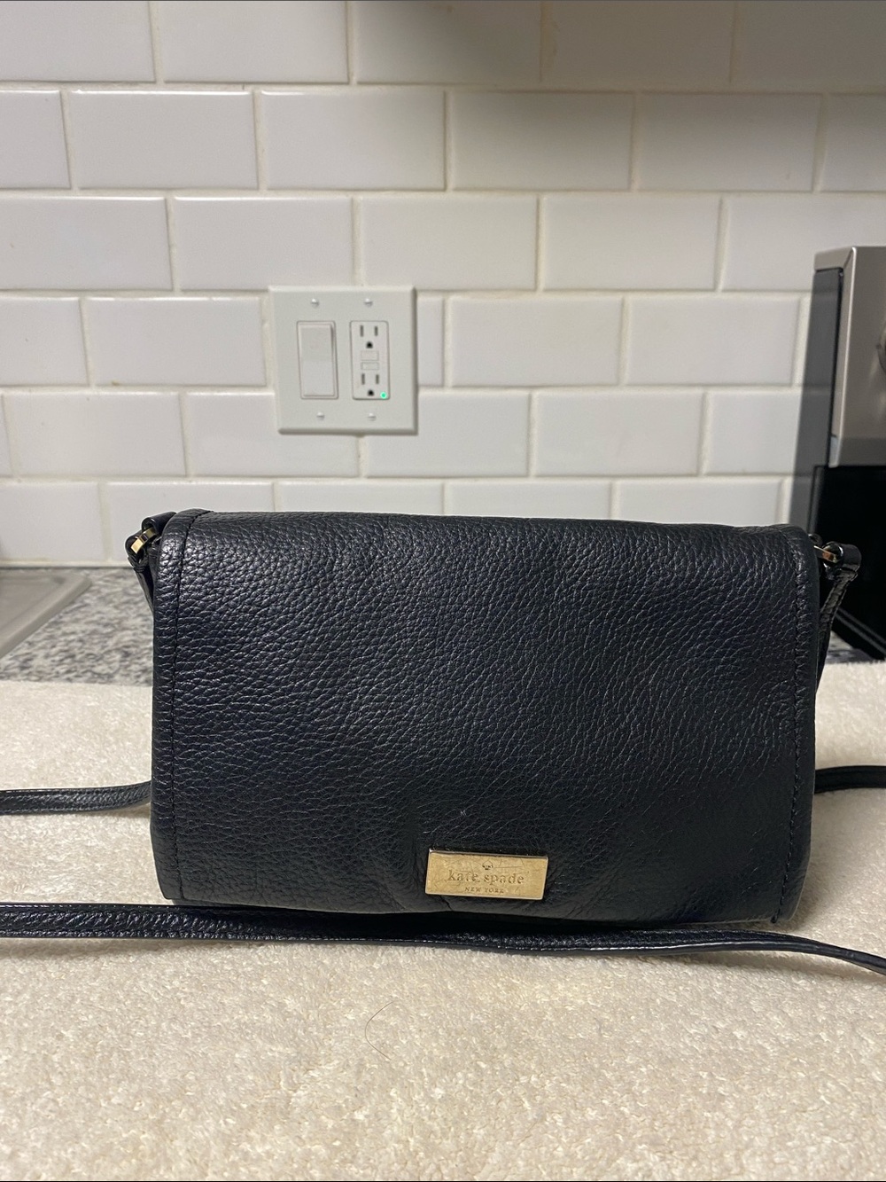 kate spade Black Pebbled Leather Crossbody with Gold Plaque